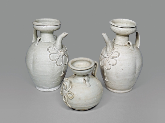 Group of Three Chinese White Ware/ Qingbai Ewers with String Design